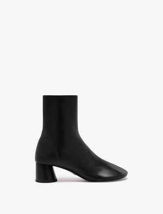 Proenza Schouler side image of Glove Ankle Boots in Slick Nappa in black