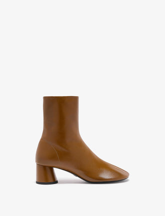 Front image of Glove Ankle Boots in Slick Nappa in Mud