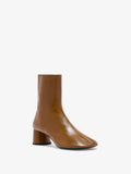 3/4 Front image of Glove Ankle Boots in Slick Nappa in Mud