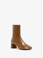 3/4 Front image of Glove Ankle Boots in Slick Nappa in Mud