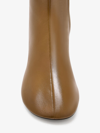 Aerial image of Glove Ankle Boots in Slick Nappa in Mud