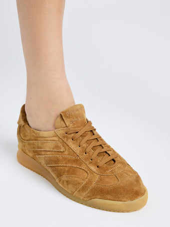 On model image of Track Sneakers in Suede in Tobacco