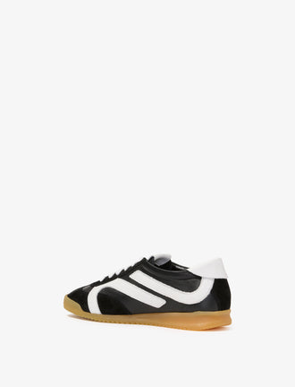Proenza Schouler back 3/4 image of Track Sneakers in black with white stripes