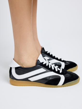 Proenza Schouler on model image of Track Sneakers in black with white stripes