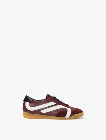 Side image of Track Sneakers in colorway Oxblood and ivory stripes.