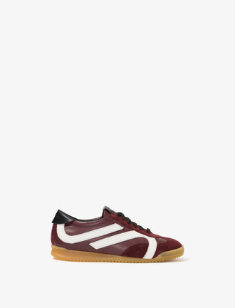 Side image of Track Sneakers in colorway Oxblood and ivory stripes.