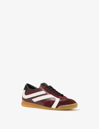 Front 3/4 image of Track Sneakers in colorway Oxblood and ivory stripes.