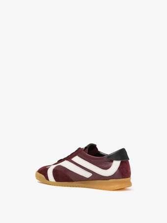 Back 3/4 image of Track Sneakers in colorway Oxblood and ivory stripes.