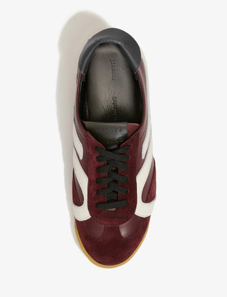 Aerial image of Track Sneakers in colorway Oxblood and ivory stripes.