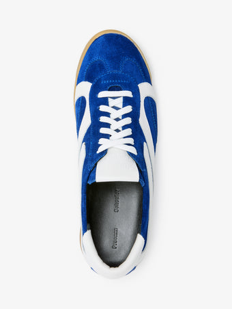 Proenza Schouler aerial image of Track Sneakers in cobalt with white stripes