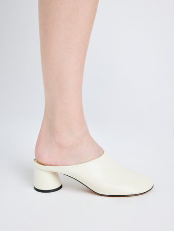 Image of model wearing Glove Mules in IVORY