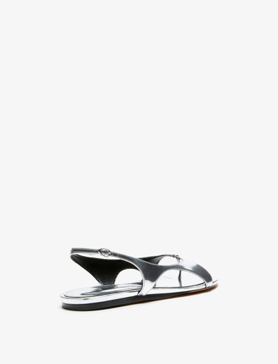 3/4 Back image of Slash Flat Thong Sandals in Silver