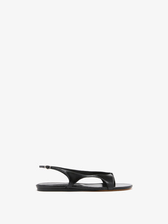 Front image of Slash Flat Thong Sandals in Black