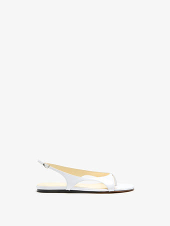 Front image of Slash Flat Thong Sandals in White