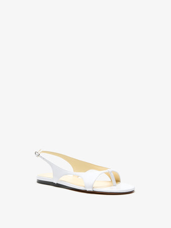 3/4 Front image of Slash Flat Thong Sandals in White