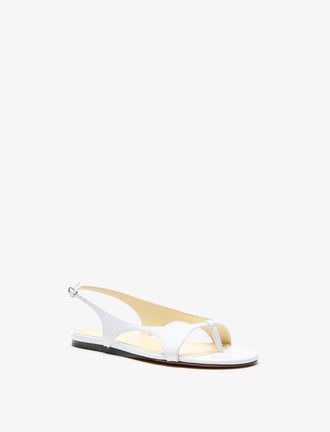 3/4 Front image of Slash Flat Thong Sandals in White