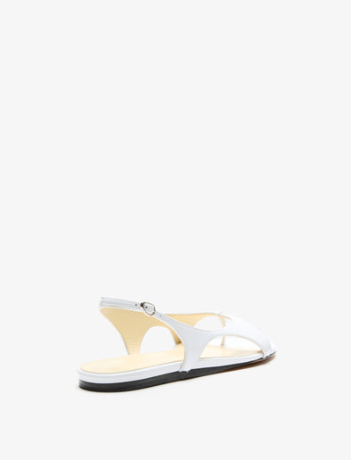 3/4 Back image of Slash Flat Thong Sandals in White