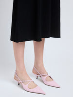 Image of model wearing Slash Crossover Slingback Pumps in Lilac