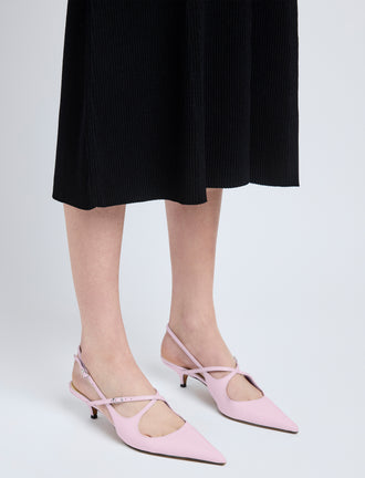 Image of model wearing Slash Crossover Slingback Pumps in Lilac