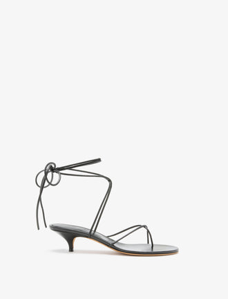 Front image of Slash Tie Sandals in Black