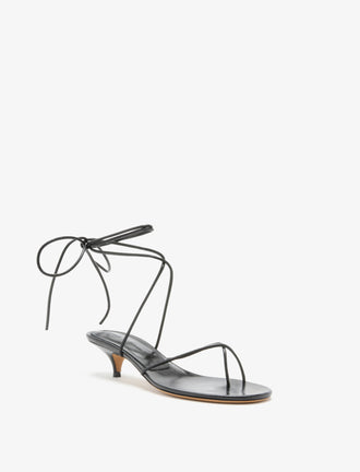 3/4 Front image of Slash Tie Sandals in Black