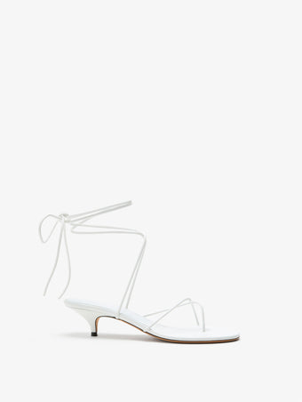 Proenza Schouler Front image of Slash Tie Sandals in White
