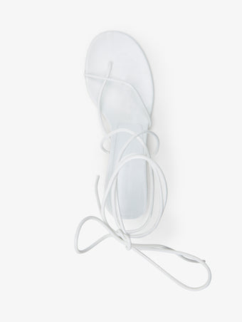 Aerial image of Slash Tie Sandals in White