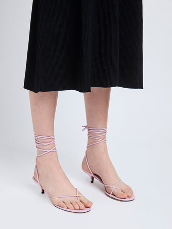 Image of model wearing Slash Tie Sandals in Lilac