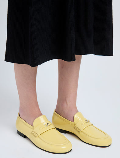 Image of model wearing Mini Monogram Loafers in Resin