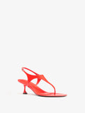 Proenza Schouler 3/4 Front image of Tee Thong Sandals in Slick Nappa in Coral