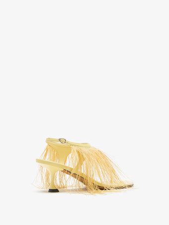 3/4 Back image of Tee Thong Feather Sandals in Resin
