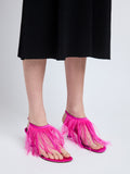 Image of model wearing Tee Thong Feather Sandals in Fuchsia