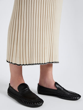 Image of model wearing Whip Loafers in Black