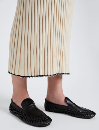 Image of model wearing Whip Loafers in Black