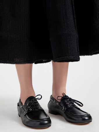 Image of model wearing Deck Shoes in Nappa in Black
