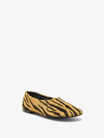 Proenza Schouler front 3/4 image of Glove Slippers in Haircalf in orange/black