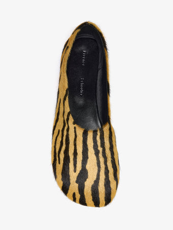 Proenza Schouler aerial image of Glove Slippers in Haircalf in orange/black