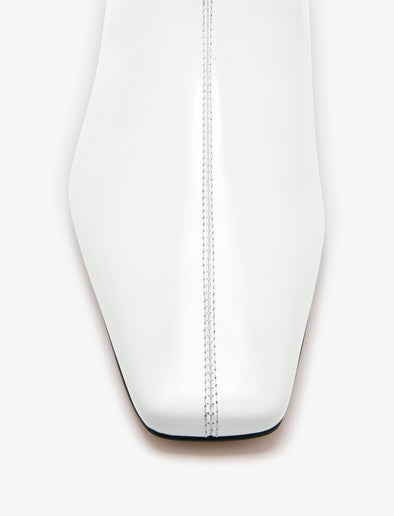 Aerial image of Trap Flat Ankle Boots in Spazzolato Leather in Ecru