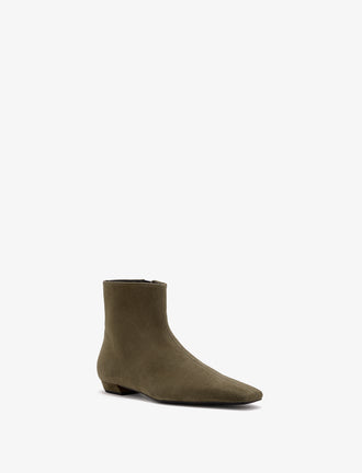 Proenza Schouler Front 3/4 image of Trap Flat Ankle Boots in Kidsuede in Moss