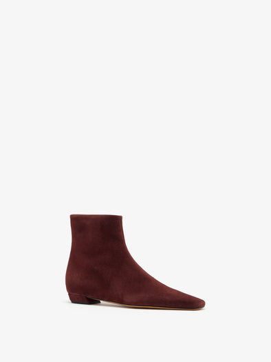 Proenza Schouler 3/4 Front image of Trap Flat Ankle Boots in Kidsuede in Merlot