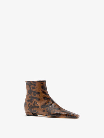 Proenza Schouler 3/4 Front image of Trap Flat Ankle Boots In Embossed Python in Ochre Multi