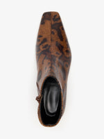 Proenza Schouler Aerial image of Trap Flat Ankle Boots In Embossed Python in Ochre Multi
