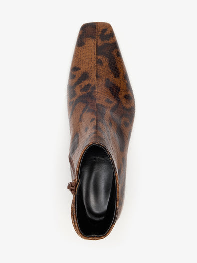 Proenza Schouler Aerial image of Trap Flat Ankle Boots In Embossed Python in Ochre Multi