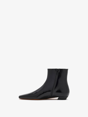 3/4 Back image of Trap Flat Ankle Boots In Nappa Leather in Black