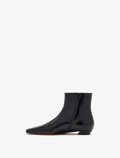 3/4 Back image of Trap Flat Ankle Boots In Nappa Leather in Black