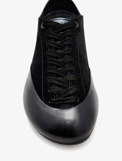 Proenza Schouler aerial image of Arcadia Sneakers in black with black laces