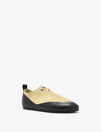 Proenza Schouler front 3/4 image of Arcadia Sneakers in Almond with almond laces