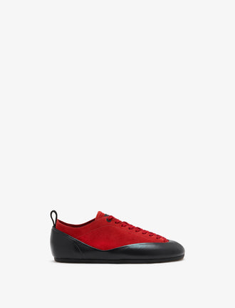 Proenza Schouler side image of Arcadia Sneakers in red with red laces