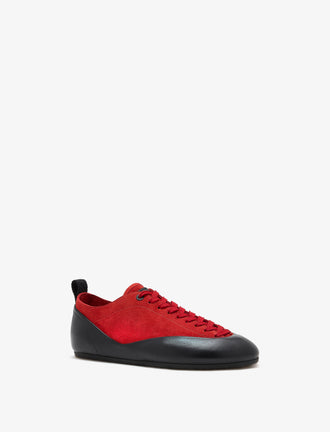 Proenza Schouler front 3/4 image of Arcadia Sneakers in red with red laces