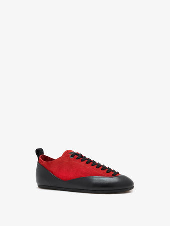 Proenza Schouler front 3/4 image of Arcadia Sneakers in red with black laces